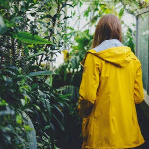 person in nature with yellow jacket